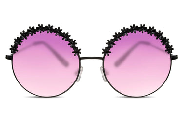 Heart-shaped sunglasses with pink lenses